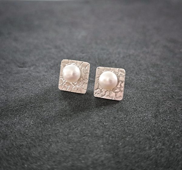 Silver stud earrings with fresh water pearl