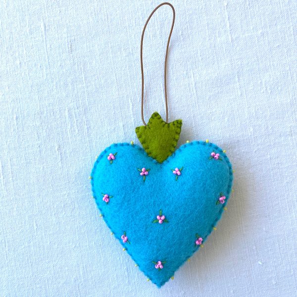 Beautiful the 'All-Seeing Heart' Ornament: A sea-blue heart ornament. - Image 4