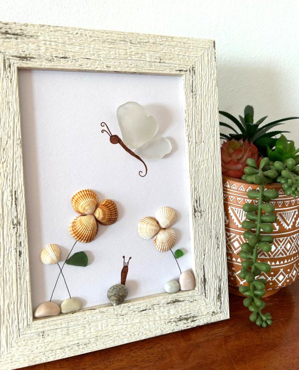 A lovely scene with a butterfly, snail, and flowers, made with seaglass and seashells, perfect as a unique gift! - Image 2