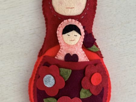 Adorable mum and baby felt nesting dolls