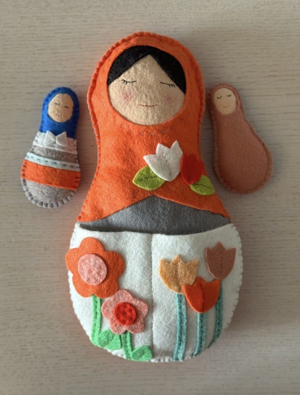 Adorable mum and 2 babies felt nesting dolls