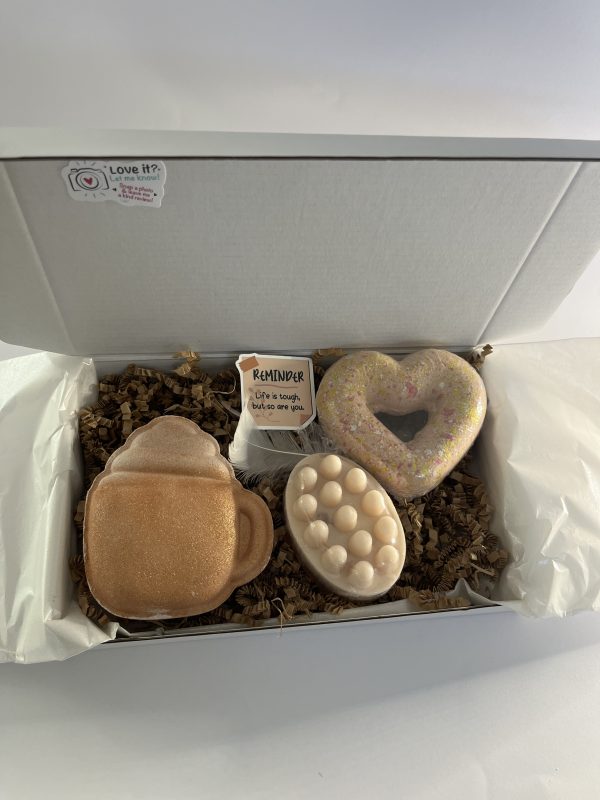Box with natural massage soap and two bath bombs