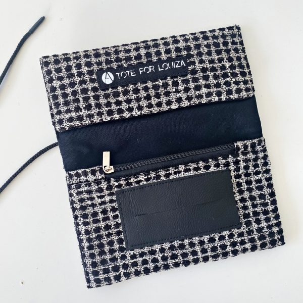 black and white tobacco pouch inside