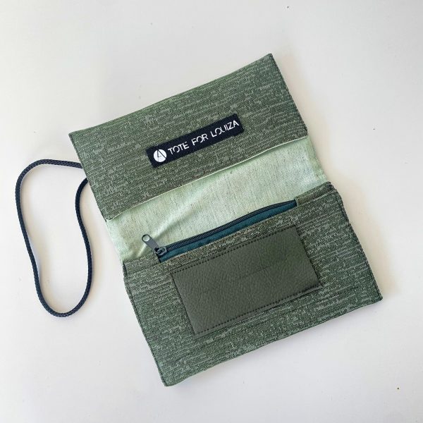 green tobacco pouch inside