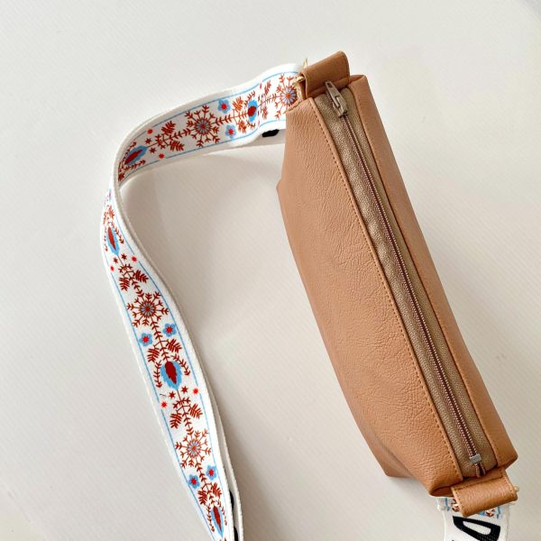 peach messenger bag with bohemian strap top