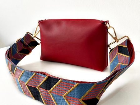 red-messenger-bag-with-chevrons-strap front